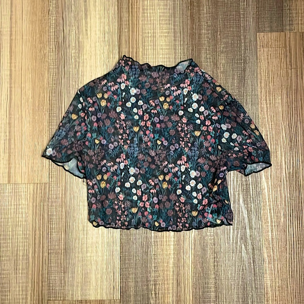 Small cropped mesh flowery top. Great for clubs & parties!